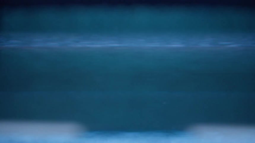 Close up of static lines running up a vintage television screen