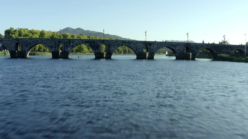 An aerial view of a bridge over a river