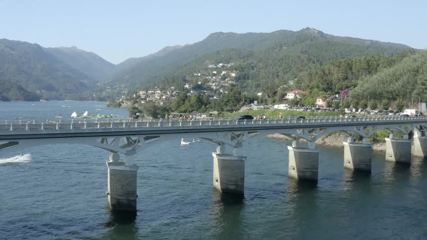 An aerial view of a bridge and river