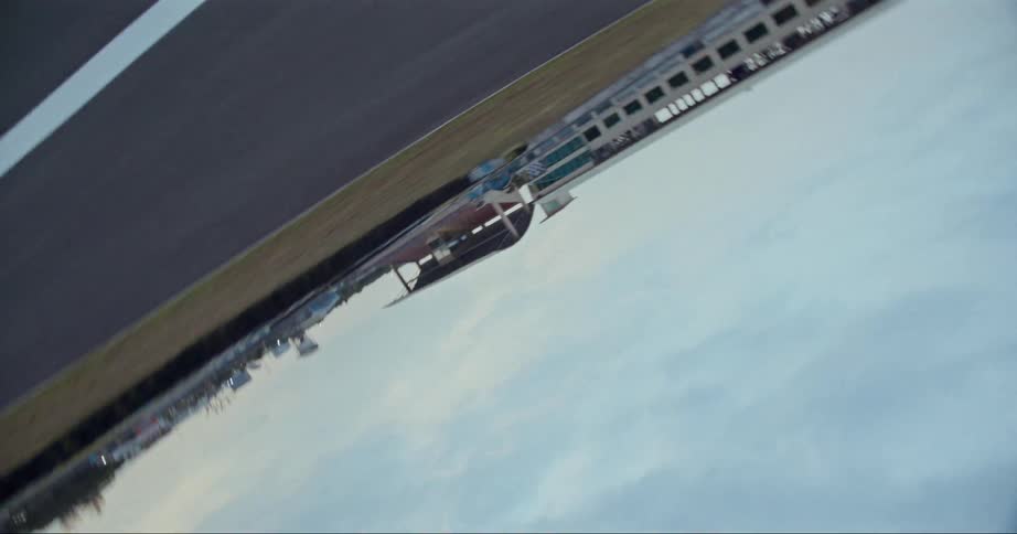A spinning view of a racing track on an overcast day