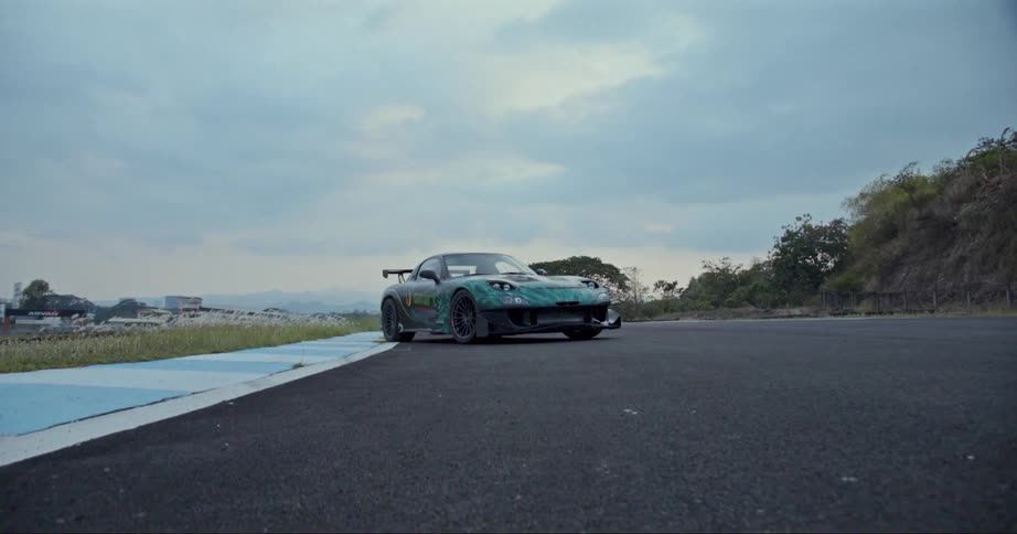 Sports race car parked on a race track at morning