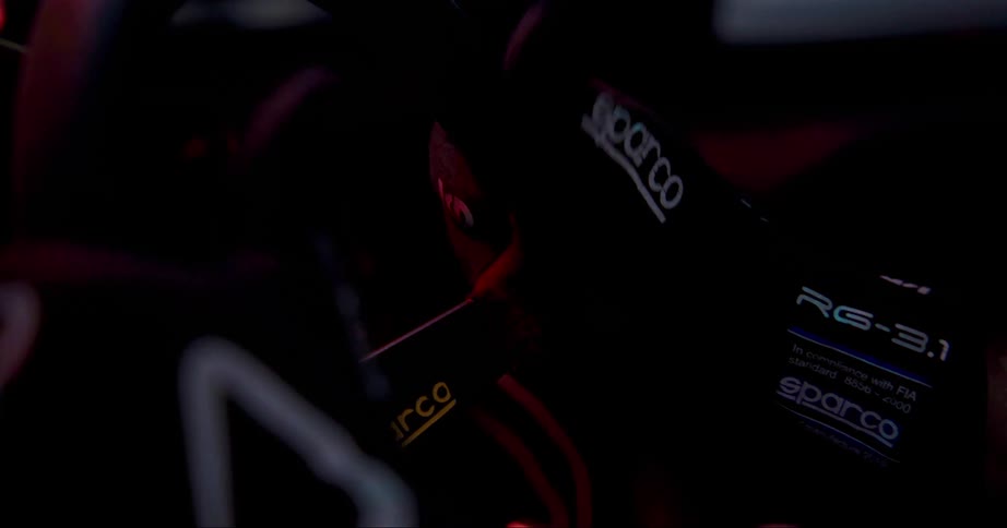 A person grabs the steering wheel and moves it back and forth