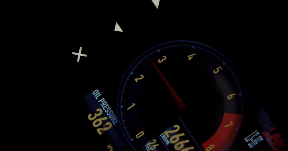 A view of a gauge on the dash in a car