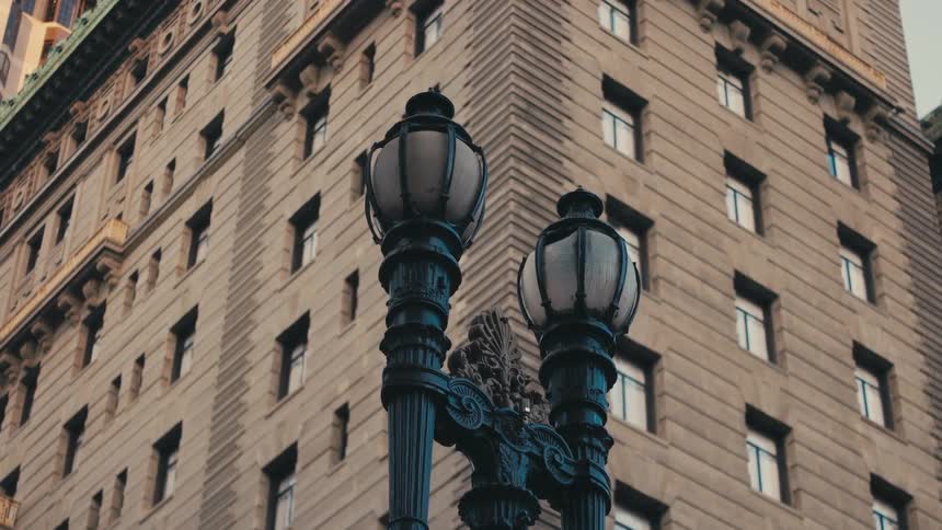 A view of a lamp outdoors in a city