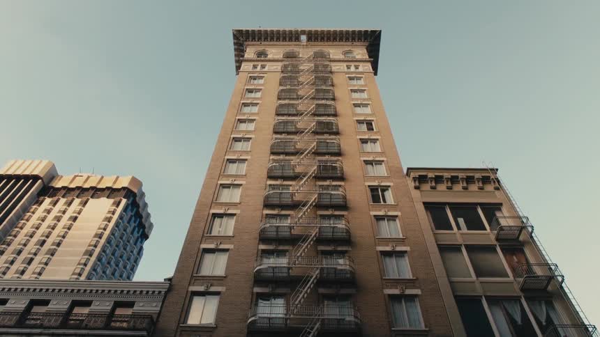 Tall buildings fill the sky