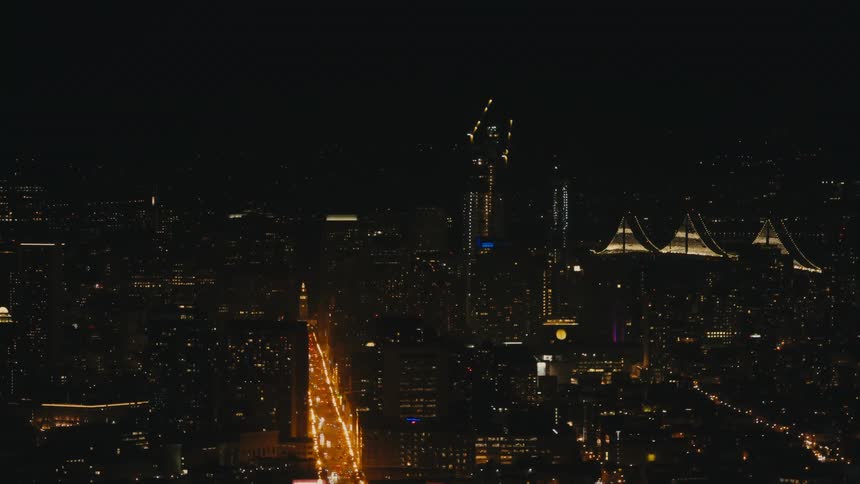 The city is brightly lit at night