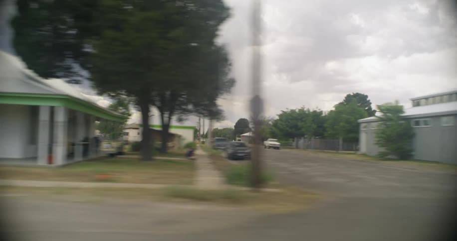 A view of a neighborhood from a car