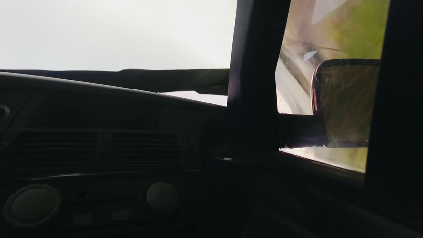 View from a passenger side window as the vehicle rolls over