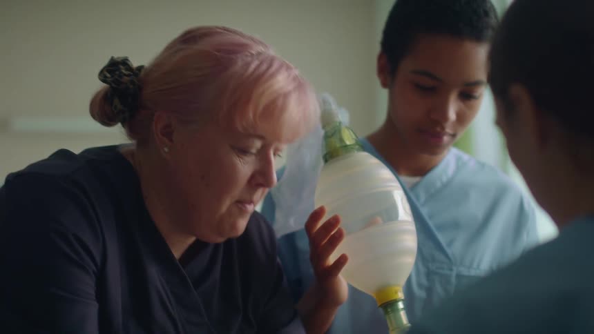 People working together in a hospital with medical equipment