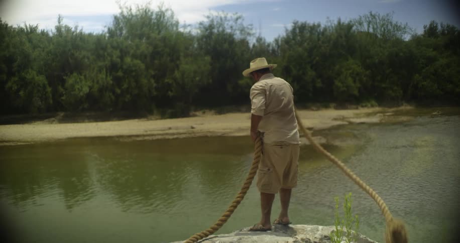 Person pulling rope in