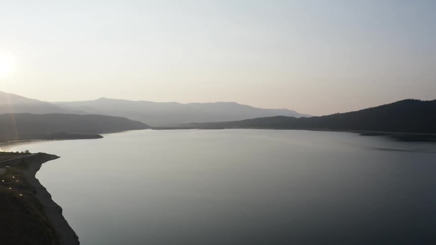 An aerial view of a large lake outdoors