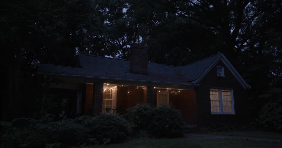 A view of a house in a neighborhood