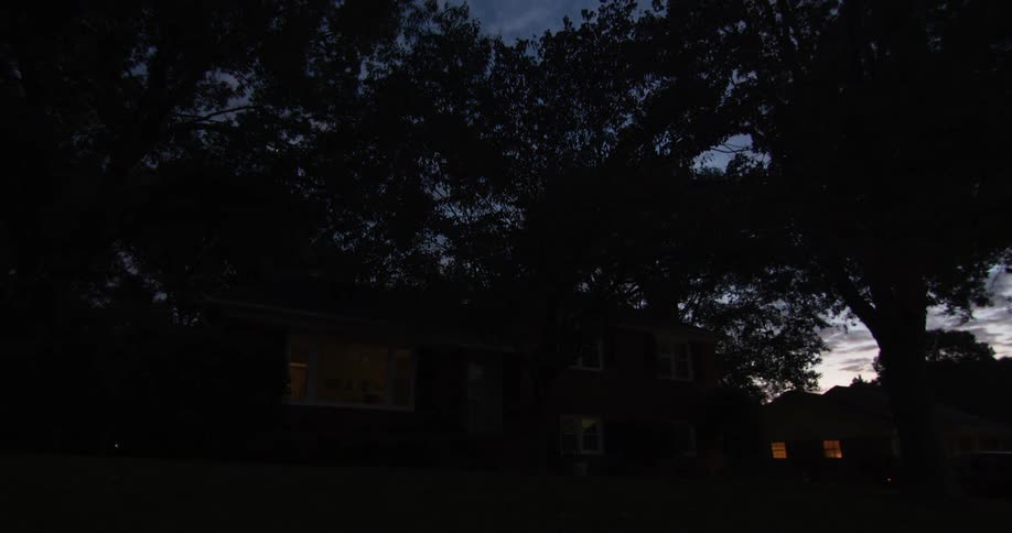 When the sun sets people can be seen in the home window