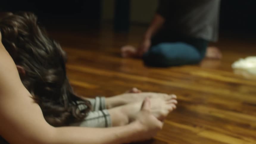 A woman stretching and doing yoga