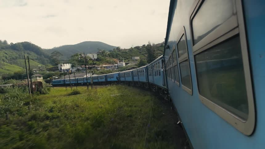 A view of a train driving outdoors