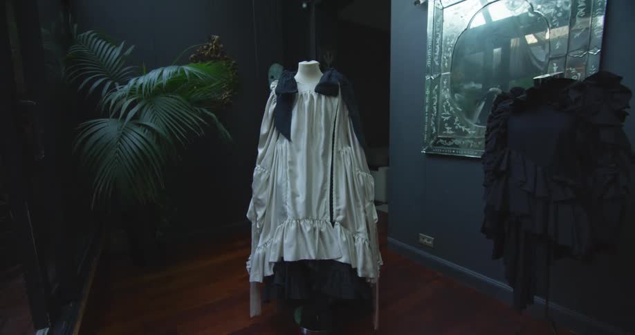 Clothing is staged on mannequins in the shop