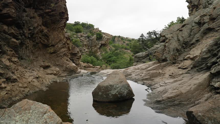 A small stream runs off the mountain