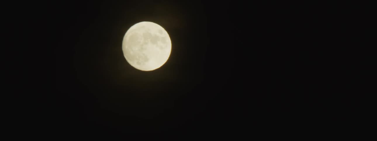 A full moon in the night sky