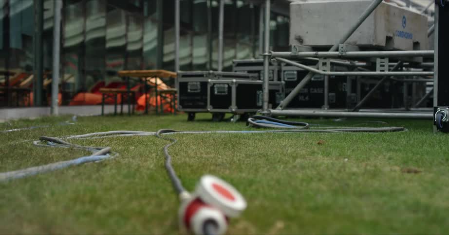 A view of a power cord on the ground