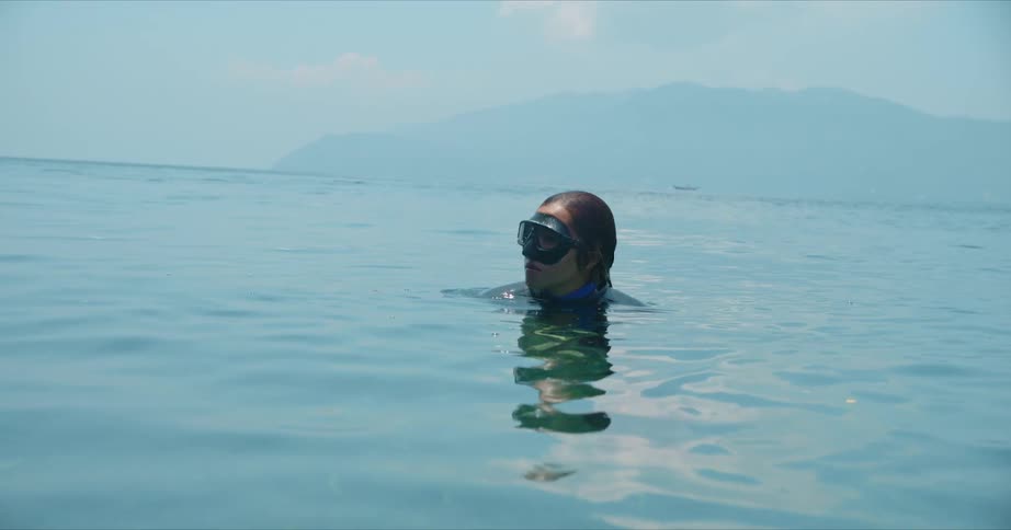 A woman swimming in the ocean