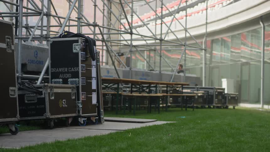 A person walking around in a stadium