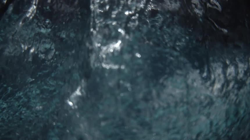 Black fabric floats underwater