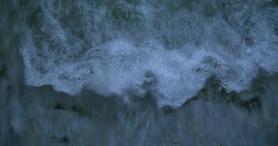 A view of water flowing down a river