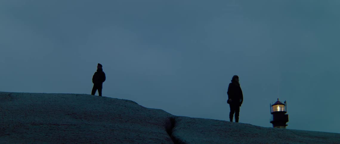 People standing on rocks