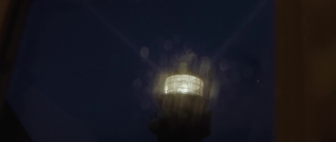 A view of a lighthouse with a rotating light