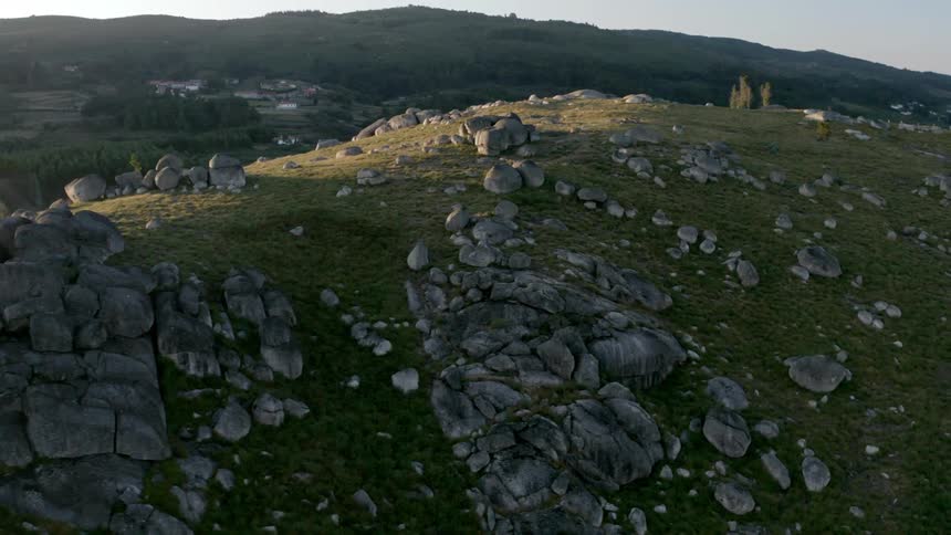 An aerial view of rocks on the top of a hill
