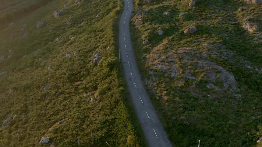 A narrow road along a rocky ridge