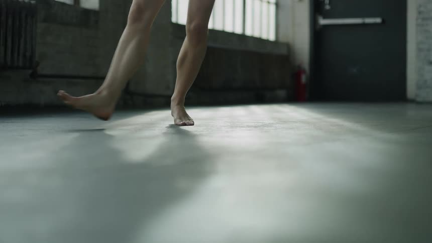 A person is dancing in the room