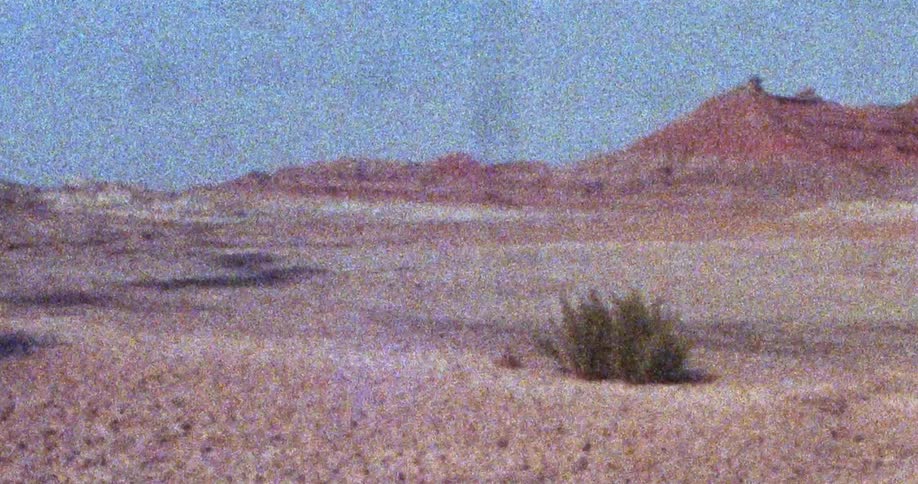 A view of the desert outdoors in the middle of the day