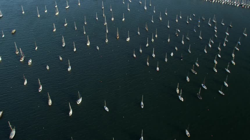 An aerial view of boats out in the ocean