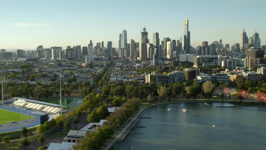 Aerial view of the skyline of a waterfront city at morning