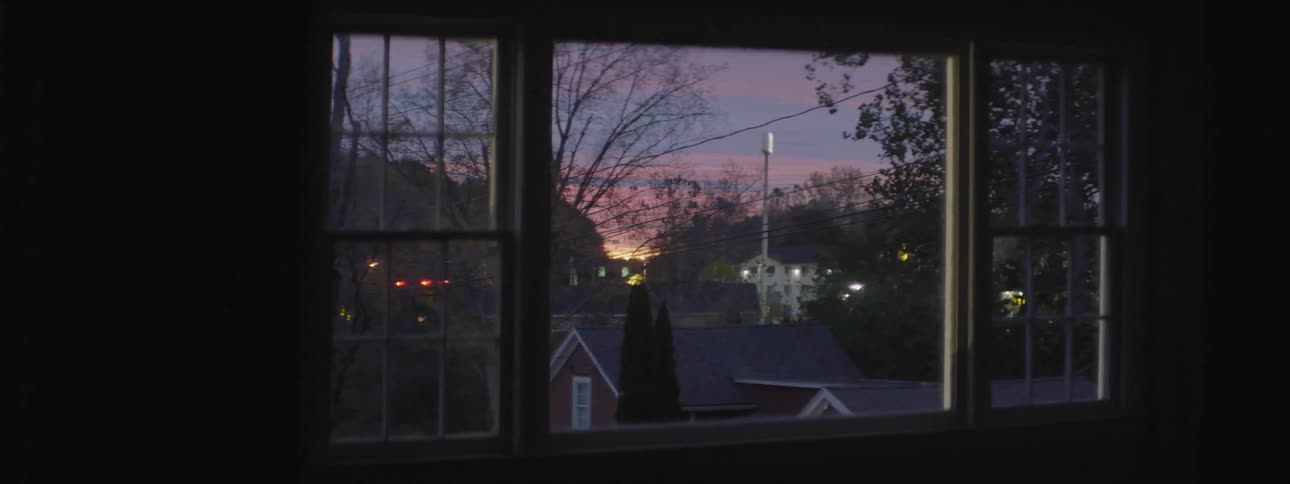 A sunset through a window