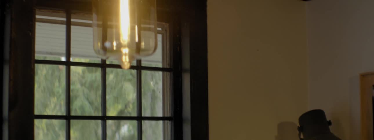 Two lights are on in a house