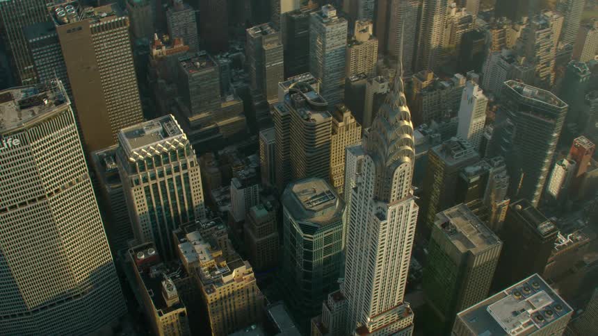 Aerial view of skyscraper and tall office buildings at dawn in the city
