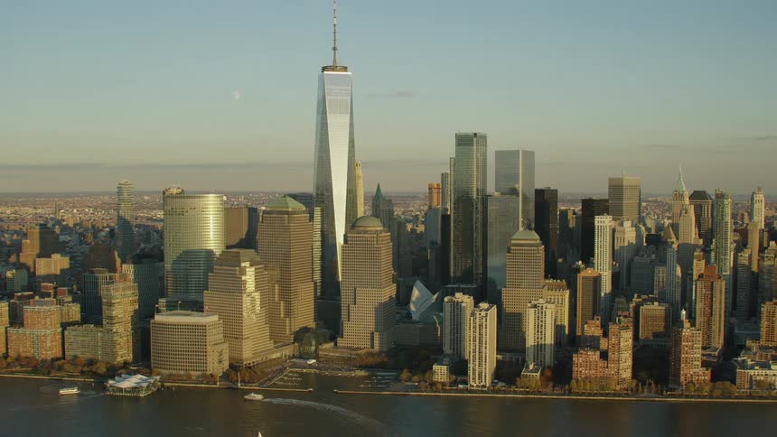 A city with buildings and skyscrapers with the sky and clouds in the background