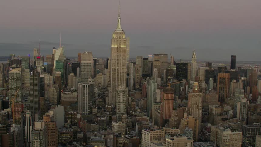 Buildings and sky scrapers in new york city at dusk
