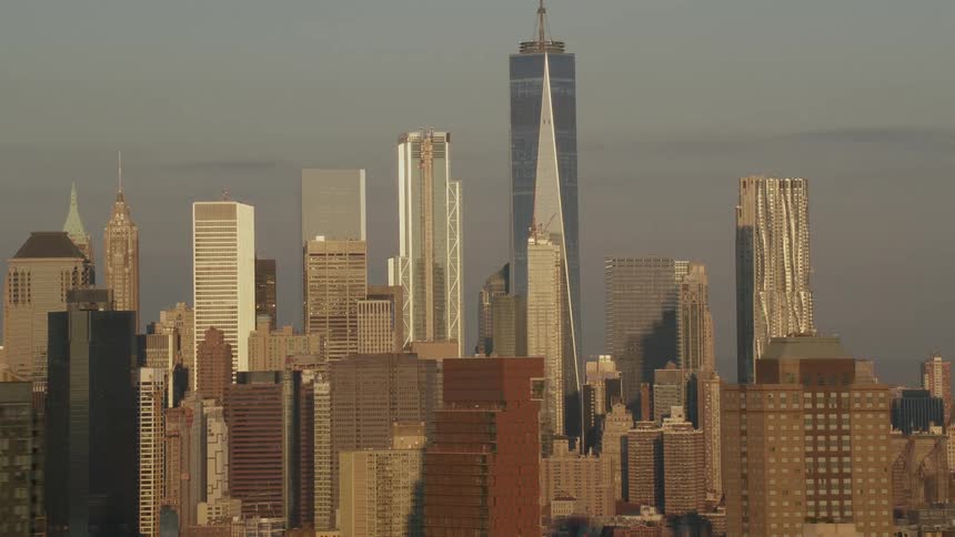 Aerial view of city skyscapers with high rise office buldings at dawn