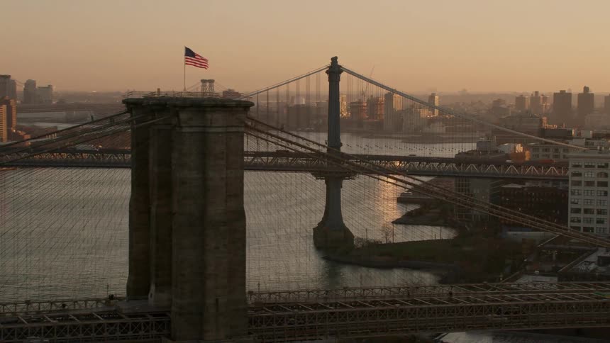 Aerial view of new york bridges over the east river at evening