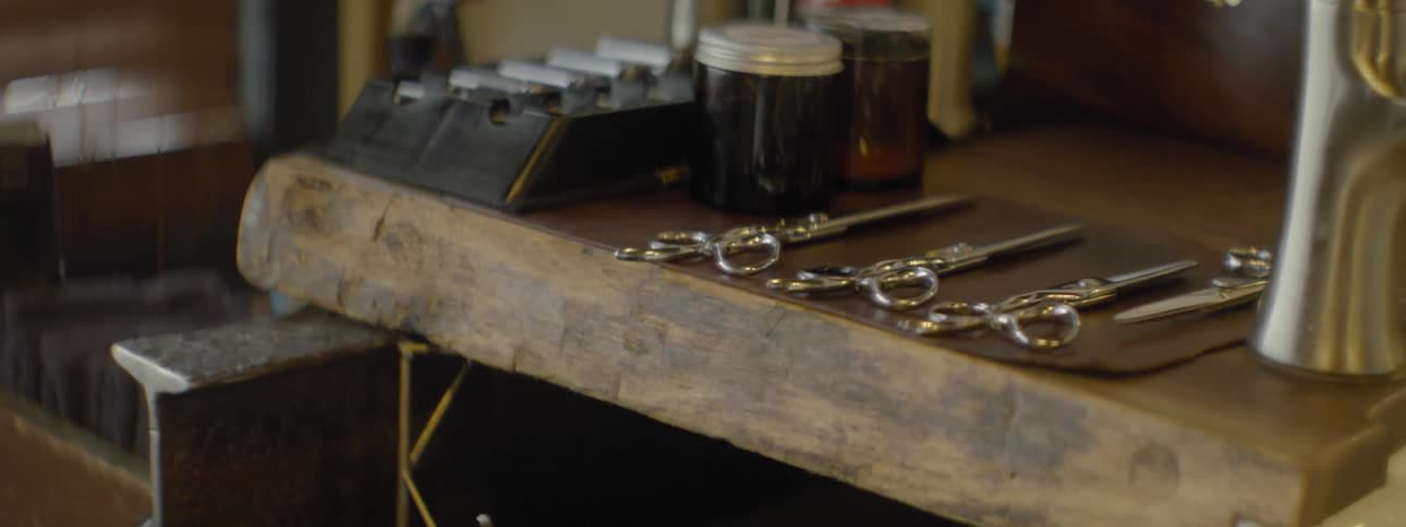 A desk full of hair cutting equipment