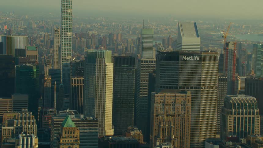 Fog obscures city and water in background behind metlife building