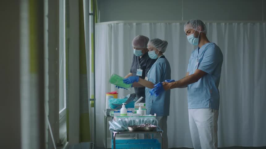 Hospital staff do prep work in the hospital