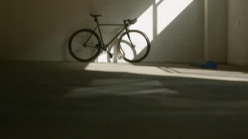 The camera quickly approached a parked bicycle