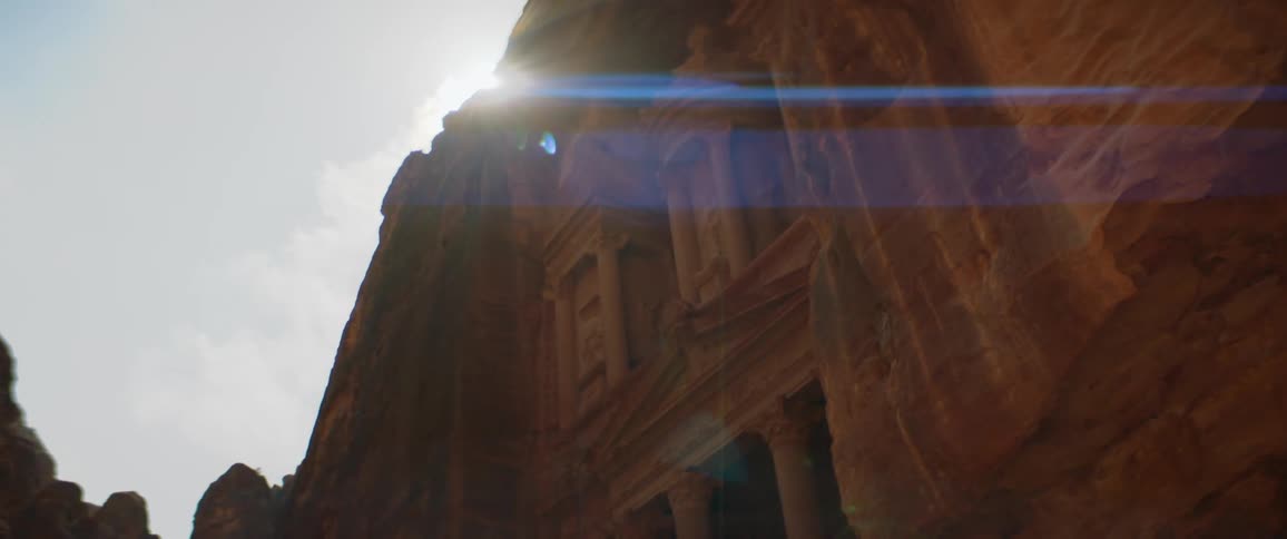 Sun shines over the ancient city of petra in jordan
