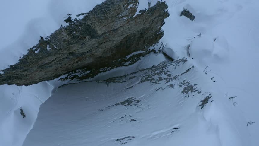 A cliff covered in snow and ice