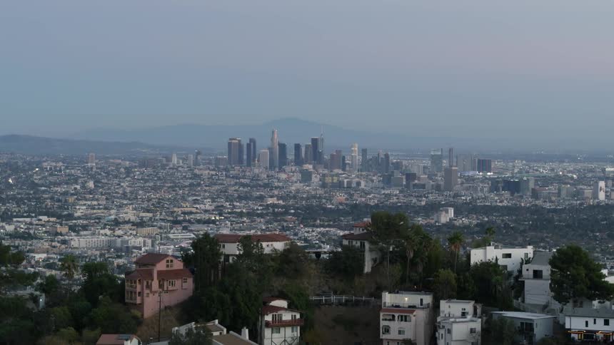 A blue hour aerial shot of Downtown Los Angeles from the perspective of Hollywood Hills