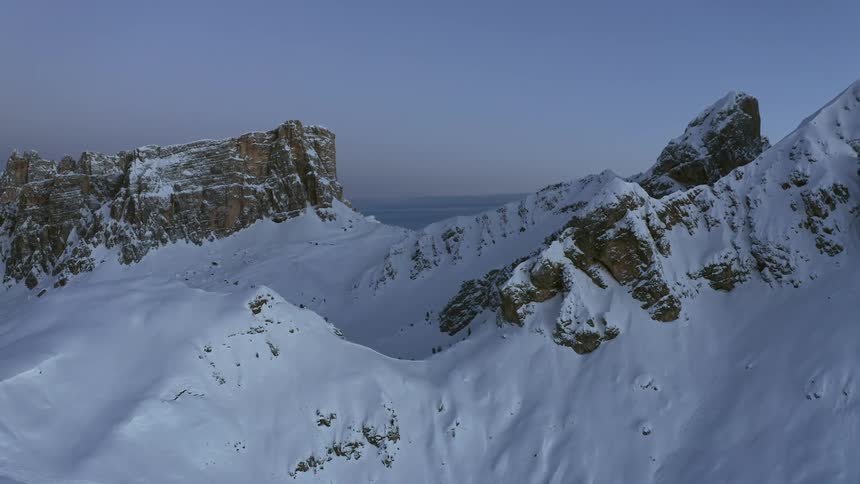 Snow is covering the large mountain range